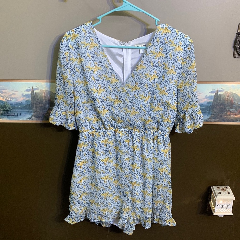 Size Large Romper. Blue and yellow floral pattern